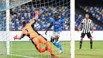 NAPLES, ITALY - SEPTEMBER 11: Kaludou Koulibaly of Napoli scores his team's second goal during the Serie A match between SSC Napoli and Juventus at Stadio Diego Armando Maradona on September 11, 2021 in Naples, Italy. (Photo by Maurizio Lagana/Getty Images)