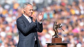 Jul 12, 2016; San Diego, CA, USA; MLB commissioner Rob Manfred on the field with the batting trophy before the 2016 MLB All Star Game at Petco Park. Mandatory Credit: Gary A. Vasquez-USA TODAY Sports