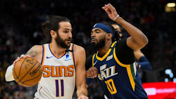 SALT LAKE CITY, UT - FEBRUARY 24: Ricky Rubio #11 of the Phoenix Suns drives past Mike Conley #10 of the Utah Jazz during a game at Vivint Smart Home Arena on February 24, 2020 in Salt Lake City, Utah. NOTE TO USER: User expressly acknowledges and agrees that, by downloading and/or using this photograph, user is consenting to the terms and conditions of the Getty Images License Agreement. (Photo by Alex Goodlett/Getty Images)