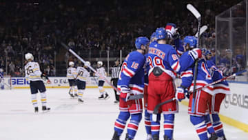 NEW YORK, NEW YORK - OCTOBER 24: Tony DeAngelo #77 and the New York Rangers celebrate his goal at 13:20 of the second period against the Buffalo Sabres at Madison Square Garden on October 24, 2019 in New York City. (Photo by Bruce Bennett/Getty Images)