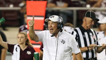 COLLEGE STATION, TEXAS - AUGUST 29: Head coach Jimbo Fisher of the Texas A&M Aggies attempts to get the attention of his offense during the fourth quarter against the Texas State Bobcats at Kyle Field on August 29, 2019 in College Station, Texas. (Photo by Bob Levey/Getty Images)