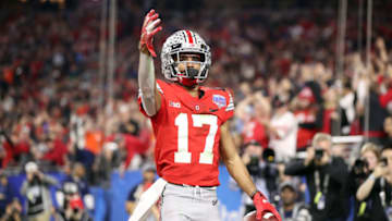 GLENDALE, ARIZONA - DECEMBER 28: Chris Olave #17 of the Ohio State Buckeyes celebrates his touchdown reception against the Clemson Tigers in the second half during the College Football Playoff Semifinal at the PlayStation Fiesta Bowl at State Farm Stadium on December 28, 2019 in Glendale, Arizona. (Photo by Christian Petersen/Getty Images)