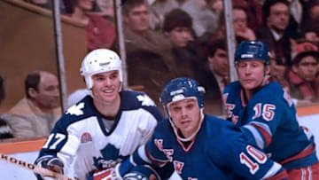 TORONTO, ON - FEBRUARY 29: Pierre Larouche #10 and Anders Hedberg #15 of the New York Rangers skate against Bill Stewart #17 of the Toronto Maple Leafs during NHL game action on February 29, 1984 at Maple Leaf Gardens in Toronto, Ontario, Canada. (Photo by Graig Abel/Getty Images)