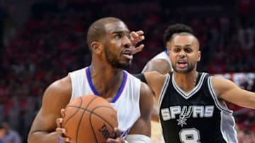 May 2, 2015; Los Angeles, CA, USA; San Antonio Spurs guard Patty Mills (8) guards Los Angeles Clippers guard Chris Paul (3) in the first half of game seven of the first round of the NBA Playoffs at Staples Center. Mandatory Credit: Jayne Kamin-Oncea-USA TODAY Sports