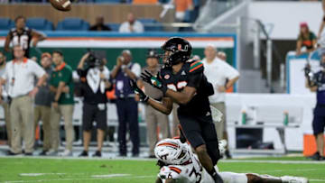 MIAMI GARDENS, FL - NOVEMBER 04: Ahmmon Richards #82 of the Miami Hurricanes makes a catch during a game against the Virginia Tech Hokies at Hard Rock Stadium on November 4, 2017 in Miami Gardens, Florida. (Photo by Mike Ehrmann/Getty Images)