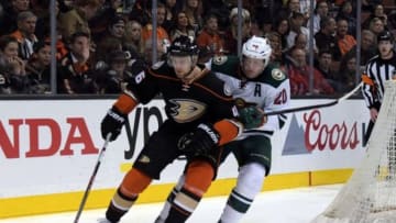 Jan 20, 2016; Anaheim, CA, USA; Anaheim Ducks left wing Jiri Sekac (46) is defended by Minnesota Wild defenseman Ryan Suter (20) in the second period during a NHL game at Honda Center. Mandatory Credit: Kirby Lee-USA TODAY Sports