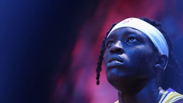PHOENIX, ARIZONA - NOVEMBER 22: Wenyen Gabriel #35 of the Los Angeles Lakers sits on the bench during a time-out from the first half of the NBA game against the Phoenix Suns at Footprint Center on November 22, 2022 in Phoenix, Arizona. The Suns defeated the Lakers 115-105. NOTE TO USER: User expressly acknowledges and agrees that, by downloading and or using this photograph, User is consenting to the terms and conditions of the Getty Images License Agreement. (Photo by Christian Petersen/Getty Images)