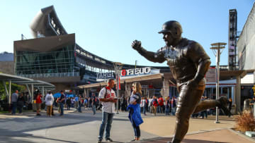 Oct 7, 2019; Minneapolis, MN, USA; Fans stand next to a Kirby Puckett statue before the start of game three of the 2019 ALDS playoff baseball series between the New York Yankees and the Minnesota Twins at Target Field. Mandatory Credit: David Berding-USA TODAY Sports