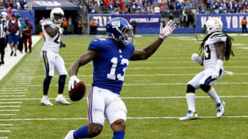 EAST RUTHERFORD, NJ - OCTOBER 08: Odell Beckham #13 of the New York Giants runs in for a touchdown during their game against Los Angeles Chargers at MetLife Stadium on October 8, 2017 in East Rutherford, New Jersey. (Photo by Jeff Zelevansky/Getty Images)