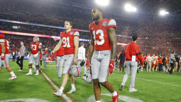 GLENDALE, ARIZONA - DECEMBER 28: Tyreke Johnson #13 of the Ohio State Buckeyes walks off the field after his teams loss to the Clemson Tigers in the College Football Playoff Semifinal at the PlayStation Fiesta Bowl at State Farm Stadium on December 28, 2019 in Glendale, Arizona. (Photo by Ralph Freso/Getty Images)