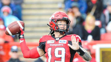 Bo Levi Mitchell #19 of the Calgary Stampeders makes a pass against the Hamilton Tiger-Cats during a CFL game at McMahon Stadium. (Photo by Derek Leung/Getty Images)