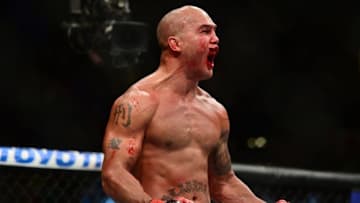 Jul 11, 2015; Las Vegas, NV, USA; Robbie Lawler (red gloves) and Rory MacDonald (not pictured) fight during their welterweight title bout during UFC 189 at MGM Grand Garden Arena. Lawler won via fifth round TKO. Mandatory Credit: Joe Camporeale-USA TODAY Sports