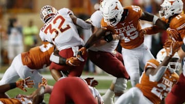 AUSTIN, TX - NOVEMBER 17: David Montgomery #32 of the Iowa State Cyclones is stopped at the line of scrimmage by Gary Johnson #33 of the Texas Longhorns and Anthony Wheeler #45 in the third quarter at Darrell K Royal-Texas Memorial Stadium on November 17, 2018 in Austin, Texas. (Photo by Tim Warner/Getty Images)