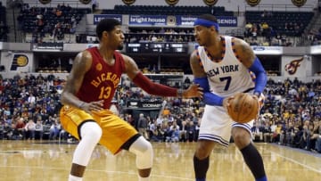 Feb 24, 2016; Indianapolis, IN, USA; New York Knicks forward Carmelo Anthony (7) is guarded by Indiana Pacers forward Paul George (13) at Bankers Life Fieldhouse. Indiana defeats New York 108-105. Mandatory Credit: Brian Spurlock-USA TODAY Sports