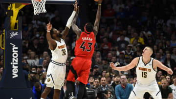 Mar 12, 2022; Denver, Colorado, USA; Denver Nuggets forward Jeff Green (32) defends on a shot by Toronto Raptors forward Pascal Siakam (43) Mandatory Credit: John Leyba-USA TODAY Sports