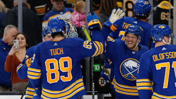 BOSTON, MA - DECEMBER 31: Alex Tuch #89 of the Buffalo Sabres celebrates his overtime goal against the Boston Bruins with his teammate Kyle Okposo #21 at the TD Garden on December 31, 2022 in Boston, Massachusetts. The Sabres won 4-3 and Tuch had two goals. (Photo by Richard T Gagnon/Getty Images)