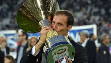 TURIN, ITALY - MAY 23: Juventus FC head coach Massimiliano Allegri celebrates with the Serie A Trophy at the end of the Serie A match between Juventus FC and SSC Napoli at Juventus Arena on May 23, 2015 in Turin, Italy. (Photo by Valerio Pennicino/Getty Images)