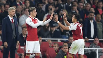 LONDON, ENGLAND - SEPTEMBER 25: Alexis Sanchez of Arsenal is replaced by Mesut Ozil of Arsenal as he is substituted during the Premier League match between Arsenal and West Bromwich Albion at Emirates Stadium on September 25, 2017 in London, England. (Photo by Mike Hewitt/Getty Images)