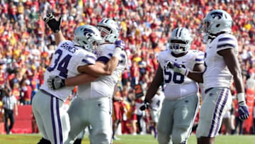 Oct 29, 2016; Ames, IA, USA; Kansas State Wildcats running back Alex Barnes (34) celebrates with teammates after his touchdown against the Iowa State Cyclones at Jack Trice Stadium. The Wildcats beat the Cyclones 31-26. Mandatory Credit: Reese Strickland-USA TODAY Sports