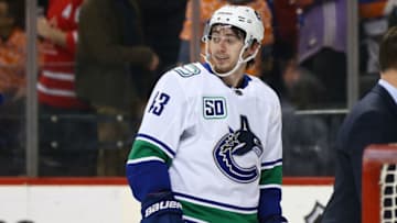 NEW YORK, NEW YORK - FEBRUARY 01: Quinn Hughes #43 of the Vancouver Canucks celebrates his game winning goal in overtime against the New York Islanders at Barclays Center on February 01, 2020 in New York City. (Photo by Mike Stobe/NHLI via Getty Images)