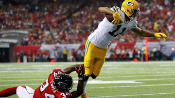 ATLANTA, GA - OCTOBER 30: Trevor Davis #11 of the Green Bay Packers attempts to break this tackle by Brian Poole #34 of the Atlanta Falcons at Georgia Dome on October 30, 2016 in Atlanta, Georgia. (Photo by Kevin C. Cox/Getty Images)