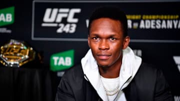 MELBOURNE, AUSTRALIA - OCTOBER 04: UFC interim middleweight champion Israel Adesanya of New Zealand interacts with media during UFC 243 Ultimate Media Day at Marvel Stadium on October 4, 2019 in Melbourne, Australia. (Photo by Jeff Bottari/Zuffa LLC/Zuffa LLC via Getty Images)