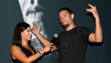 LAS VEGAS, NV - AUGUST 18: UFC host and reporter Megan Olivi (L) interviews mixed martial artist Nate Diaz during an open workout for UFC 202 at Rocks Lounge at the Red Rock Casino on August 18, 2016 in Las Vegas, Nevada. Diaz is scheduled to fight UFC featherweight champion Conor McGregor in a welterweight rematch at UFC 202 on August 20, 2016 in Las Vegas. (Photo by Ethan Miller/Getty Images)