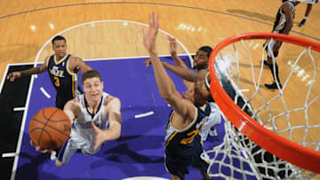 SACRAMENTO, CA - DECEMBER 11: Jimmer Fredette #7 of the Sacramento Kings drives to the basket against the Utah Jazz at Sleep Train Arena on December 11, 2013 in Sacramento, California. Copyright 2013 NBAE (Photo by Garrett Ellwood/NBAE via Getty Images)