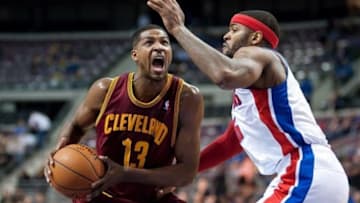 Feb 12, 2014; Auburn Hills, MI, USA; Detroit Pistons small forward Josh Smith (6) guards Cleveland Cavaliers power forward Tristan Thompson (13) during the third quarter at The Palace of Auburn Hills. Cleveland won 93-89. Mandatory Credit: Tim Fuller-USA TODAY Sports
