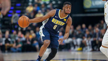 INDIANAPOLIS, IN - DECEMBER 10: Emmanuel Mudiay #0 of the Denver Nuggets dribbles the ball against the Indiana Pacers at Bankers Life Fieldhouse on December 10, 2017 in Indianapolis, Indiana. NOTE TO USER: User expressly acknowledges and agrees that, by downloading and or using this photograph, User is consenting to the terms and conditions of the Getty Images License Agreement. (Photo by Michael Hickey/Getty Images)