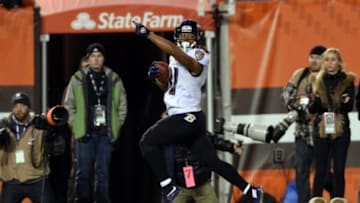 Nov 30, 2015; Cleveland, OH, USA; Baltimore Ravens wide receiver Kaelin Clay (81) returns a punt for a touchdown against the Cleveland Browns during the first quarter at FirstEnergy Stadium. Mandatory Credit: Ken Blaze-USA TODAY Sports