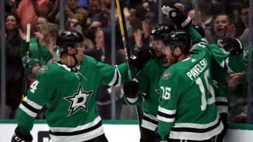 DALLAS, TEXAS - FEBRUARY 23: Joe Pavelski #16 of the Dallas Stars celebrates a goal with Alexander Radulov #47 and Miro Heiskanen #4 of the Dallas Stars against the Chicago Blackhawks in the first period at American Airlines Center on February 23, 2020 in Dallas, Texas. (Photo by Ronald Martinez/Getty Images)