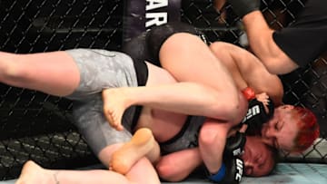 LIVERPOOL, ENGLAND - MAY 27: (L-R) Gillian Robertson of Canada attempts to submit Molly McCann of England in their womens flyweight bout during the UFC Fight Night event at ECHO Arena on May 27, 2018 in Liverpool, England. (Photo by Josh Hedges/Zuffa LLC/Zuffa LLC via Getty Images)