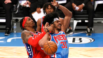 NEW YORK, NEW YORK - JANUARY 07: Dwight Howard #39 of the Philadelphia 76ers fouls Jarrett Allen #31 of the Brooklyn Nets during the second half at Barclays Center on January 07, 2021 in the Brooklyn borough of New York City. NOTE TO USER: User expressly acknowledges and agrees that, by downloading and or using this photograph, User is consenting to the terms and conditions of the Getty Images License Agreement. (Photo by Sarah Stier/Getty Images)