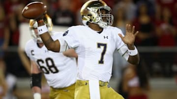 PALO ALTO, CA - NOVEMBER 25: Brandon Wimbush #7 of the Notre Dame Fighting Irish passes the ball against the Stanford Cardinal at Stanford Stadium on November 25, 2017 in Palo Alto, California. (Photo by Ezra Shaw/Getty Images)