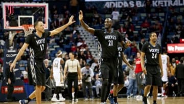 Jan 19, 2016; New Orleans, LA, USA; Minnesota Timberwolves forward Kevin Garnett (21) celebrates with forward Tayshaun Prince (12) during the second quarter of a game against the New Orleans Pelicans at the Smoothie King Center. Mandatory Credit: Derick E. Hingle-USA TODAY Sports