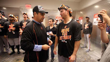 Oct 2, 2016; Bronx, NY, USA; Baltimore Orioles general manager Dan Duquette celebrates with his players after beating the New York Yankees 5-2 to clinch an American League Wild Card playoff spot at Yankee Stadium. Mandatory Credit: Danny Wild-USA TODAY Sports
