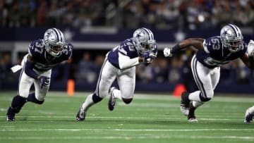 ARLINGTON, TEXAS - NOVEMBER 10: Donovan Wilson #37, Jamize Olawale #49 and Justin March #53 of the Dallas Cowboys at AT&T Stadium on November 10, 2019 in Arlington, Texas. (Photo by Ronald Martinez/Getty Images)