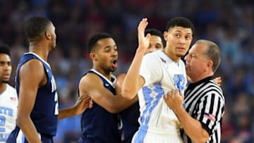 Apr 4, 2016; Houston, TX, USA; North Carolina Tar Heels forward Justin Jackson (44) is held back a referee during the first half in the championship game of the 2016 NCAA Men
