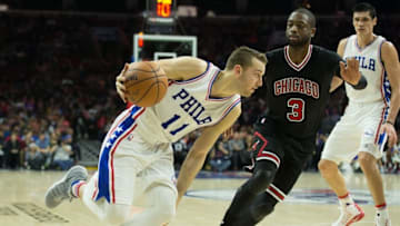 Nov 25, 2016; Philadelphia, PA, USA; Philadelphia 76ers guard Nik Stauskas (11) dribbles against Chicago Bulls guard Dwyane Wade (3) during the second half at Wells Fargo Center. The Chicago Bulls won 105-89. Mandatory Credit: Bill Streicher-USA TODAY Sports