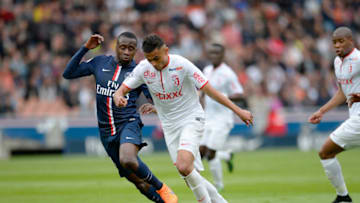 PARIS, FRANCE - APRIL 25: Blaise Matuidi (L) of PSF and Sofiane Boufal (R) of Llosc Lille in action during the Ligue 1 game between Paris Saint Germain and Llosc Lille at Parc des Princes on April 25, 2015 in Paris, France. (Photo by Aurelien Meunier/Getty Images)