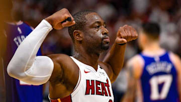 MIAMI, FL - APRIL 21: Dwyane Wade #3 of the Miami Heat flexes his biceps after scoring and getting fouled in the fourth quarter against the Philadelphia 76ers during Game Four of Round One of the 2018 NBA Playoffs at American Airlines Arena on April 21, 2018 in Miami, Florida. NOTE TO USER: User expressly acknowledges and agrees that, by downloading and or using this photograph, User is consenting to the terms and conditions of the Getty Images License Agreement. (Photo by Mark Brown/Getty Images)