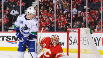 CALGARY, AB - OCTOBER 05: Michael Ferland #79 of the Vancouver Canucks takes a shot on the net of David Rittich #33 of the Calgary Flames during an NHL game at Scotiabank Saddledome on October 5, 2019 in Calgary, Alberta, Canada. (Photo by Derek Leung/Getty Images)