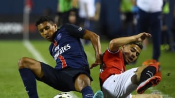 Jul 29, 2015; Chicago, IL, USA; Paris Saint-Germain defender Marquinhos (5) tackles Manchester United midfielder Andreas Pereira (44) during the second half at Soldier Field. Paris Saint-Germain defeats Manchester United 2-0. Mandatory Credit: Mike DiNovo-USA TODAY Sports