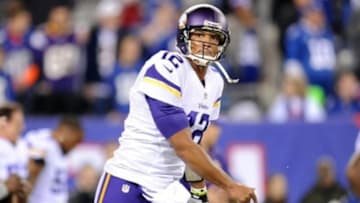 Oct 21, 2013; East Rutherford, NJ, USA; Minnesota Vikings quarterback Josh Freeman (12) warms up prior to facing the New York Giants at MetLife Stadium. Mandatory Credit: Joe Camporeale-USA TODAY Sports