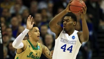 Mar 28, 2015; Cleveland, OH, USA; Kentucky Wildcats center Dakari Johnson (44) is guarded by Notre Dame Fighting Irish forward Zach Auguste (30) during the first half in the finals of the midwest regional of the 2015 NCAA Tournament at Quicken Loans Arena. Mandatory Credit: Andrew Weber-USA TODAY Sports