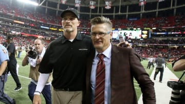 Sep 14, 2015; Atlanta, GA, USA; Atlanta Falcons head coach Dan Quinn (left) celebrates with general manager Thomas Dimitroff (right) following their 26-24 win over the Philadelphia Eagles at the Georgia Dome. Mandatory Credit: Jason Getz-USA TODAY Sports