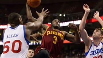 Feb 18, 2014; Philadelphia, PA, USA; Cleveland Cavaliers guard Dion Waiters (3) goes up for a dunk during the second quarter against the Philadelphia 76ers at the Wells Fargo Center. Waiters would injure his knee on the play and leave the game shortly after. The Cavaliers defeated the Sixers 114-85. Mandatory Credit: Howard Smith-USA TODAY Sports