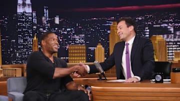 NEW YORK, NY - JULY 14: Former professional football player and talk show host Michael Strahan (L) is interviewed by talk show host/comedian Jimmy Fallon during his visit to "The Tonight Show Starring Jimmy Fallon" at Rockefeller Center on July 14, 2014 in New York City. (Photo by Mike Coppola/NBC/Getty Images for "The Tonight Show Starring Jimmy Fallon")