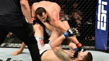 BOSTON, MASSACHUSETTS - OCTOBER 18: (L-R) Dominick Reyes punches Chris Weidman in their light heavyweight bout during the UFC Fight Night event at TD Garden on October 18, 2019 in Boston, Massachusetts. (Photo by Chris Unger/Zuffa LLC via Getty Images)